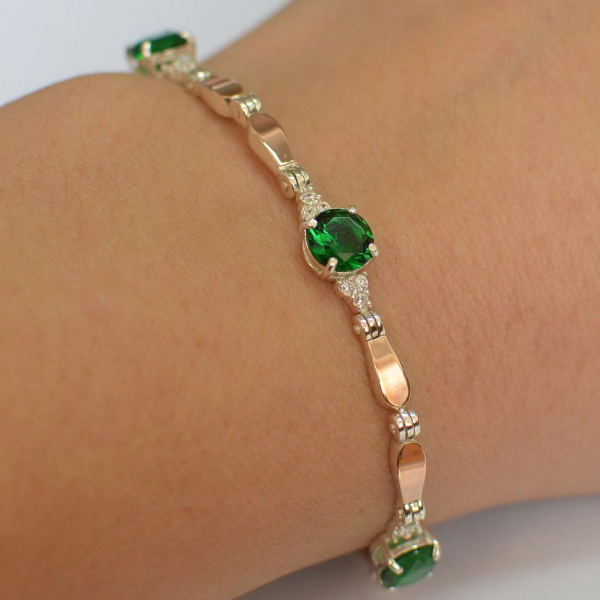 Срібний браслет з золотими пластинами