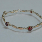 Срібний браслет з золотими пластинами