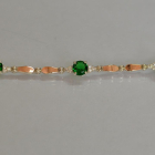 Срібний браслет з золотими пластинами