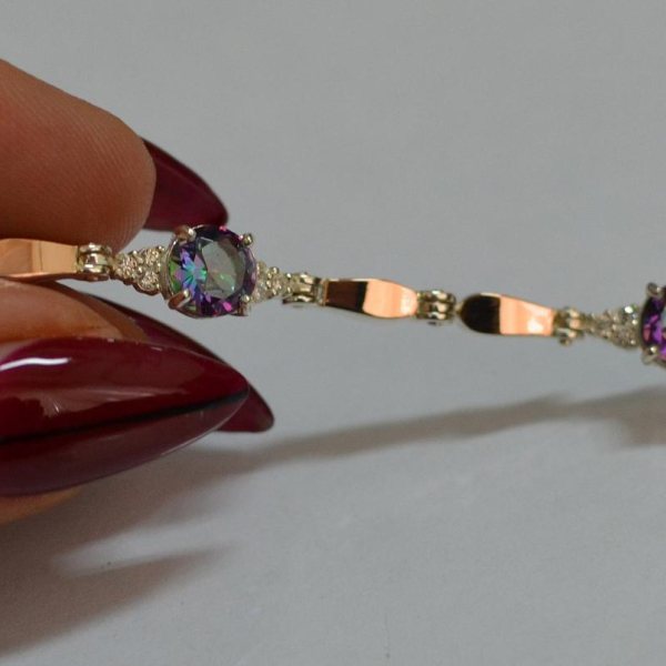 Срібний браслет з золотими пластинами