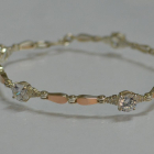 Срібний браслет з золотими пластинами