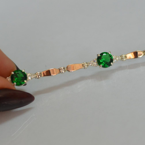 Срібний браслет з золотими пластинами