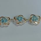 Серебряный браслет с золотыми вставками