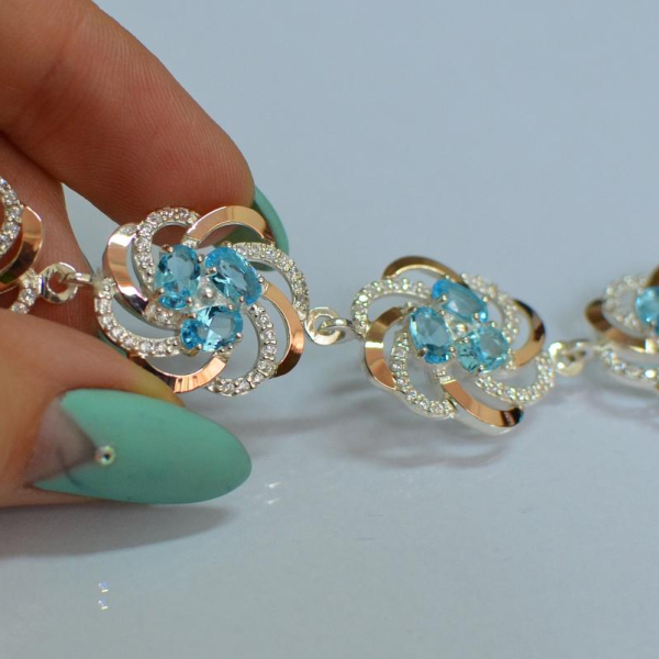 Серебряный браслет с золотыми вставками