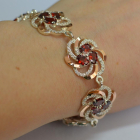 Серебряный браслет с золотыми вставками