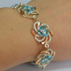 Серебряный браслет с золотыми вставками