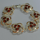 Серебряный браслет с золотыми вставками