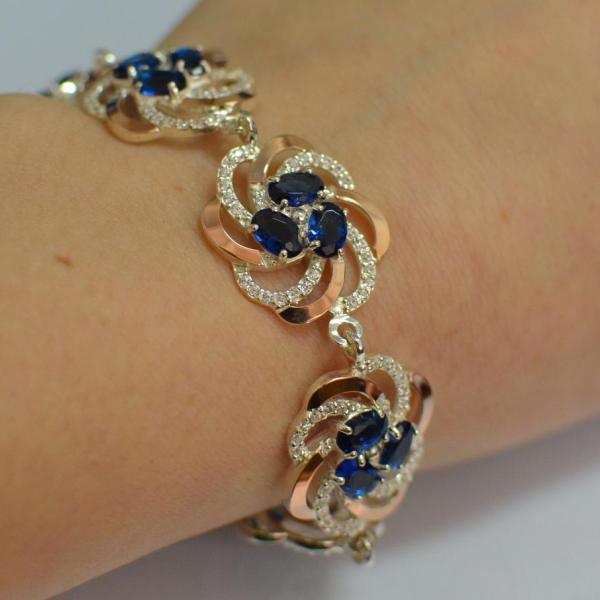 Серебряный браслет с золотыми вставками