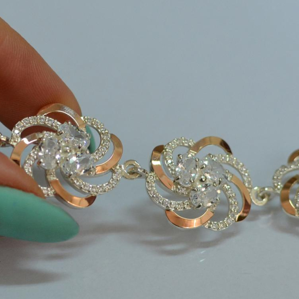 Серебряный браслет с золотыми вставками