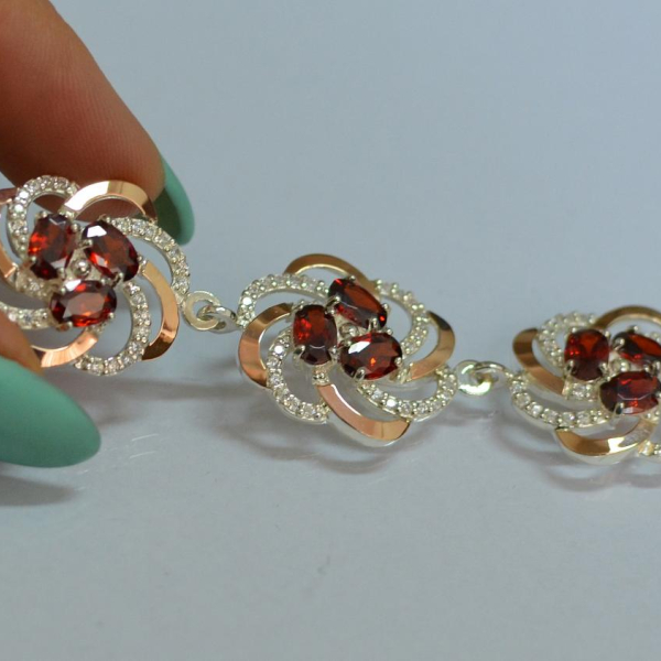 Серебряный браслет с золотыми вставками