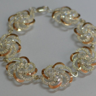 Серебряный браслет с золотыми вставками