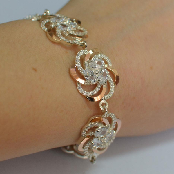 Серебряный браслет с золотыми вставками