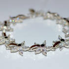 Срібний браслет з напайками із золота