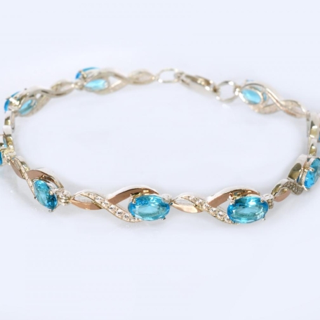 Срібний браслет з золотими пластинами та фіанітами