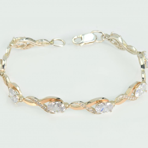 Срібний браслет з золотими пластинами та фіанітами