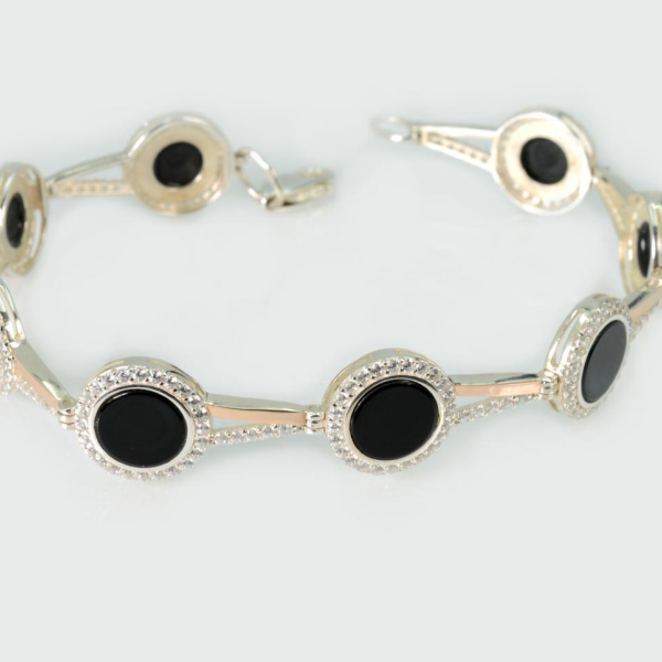 Срібний браслет з золотими пластинами та фіанітами