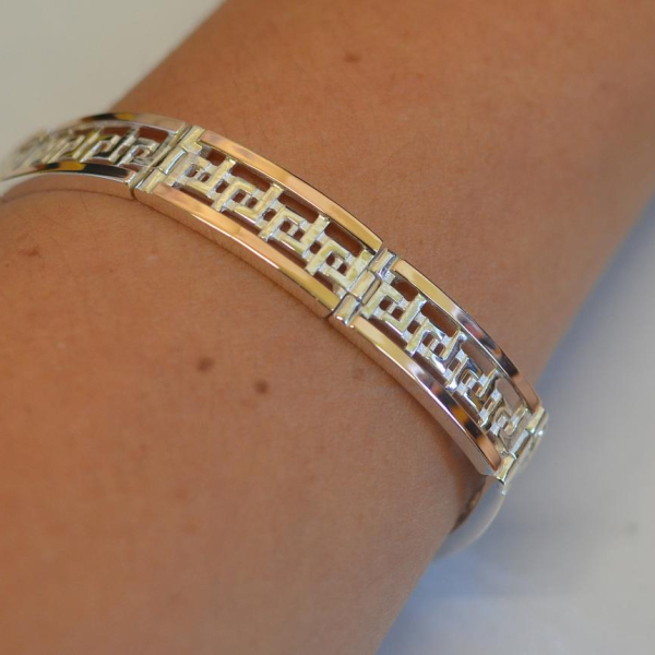 Срібний браслет з пластинами із золота