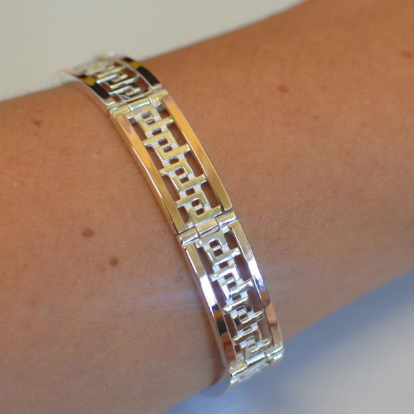 Срібний браслет з пластинами із золота