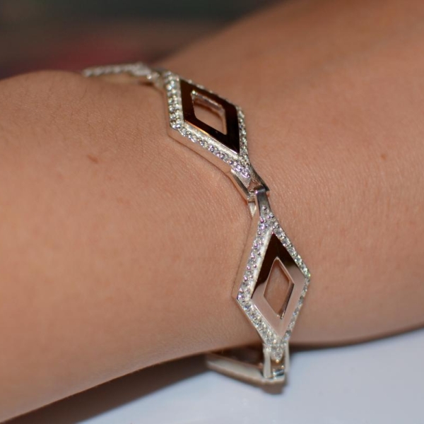 Срібний браслет з напайками із золота