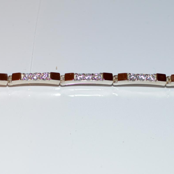 Срібний браслет зі вставками з золота