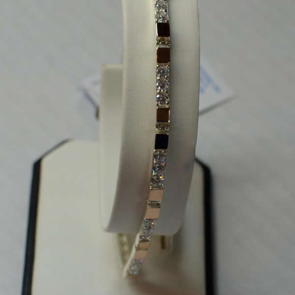 Срібний браслет зі вставками з золота