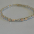 Срібний браслет зі вставками з золота