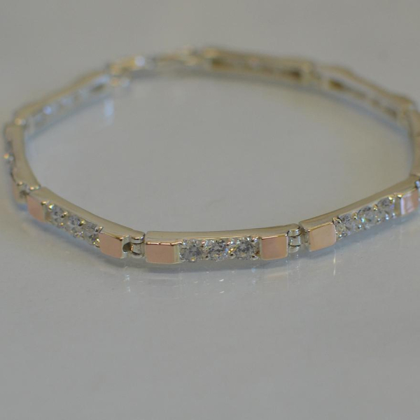 Срібний браслет зі вставками з золота