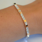 Срібний браслет зі вставками з золота