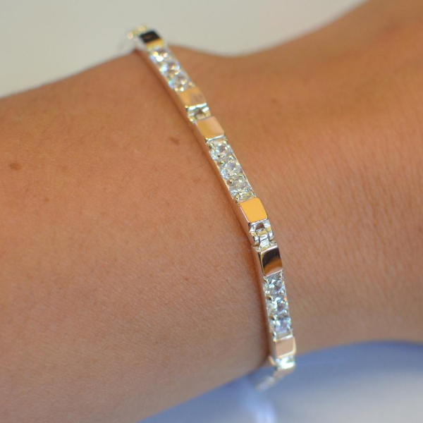 Срібний браслет зі вставками з золота