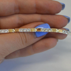 Срібний браслет зі вставками з золота