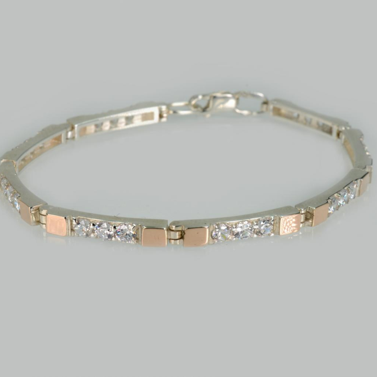 Срібний браслет зі вставками з золота