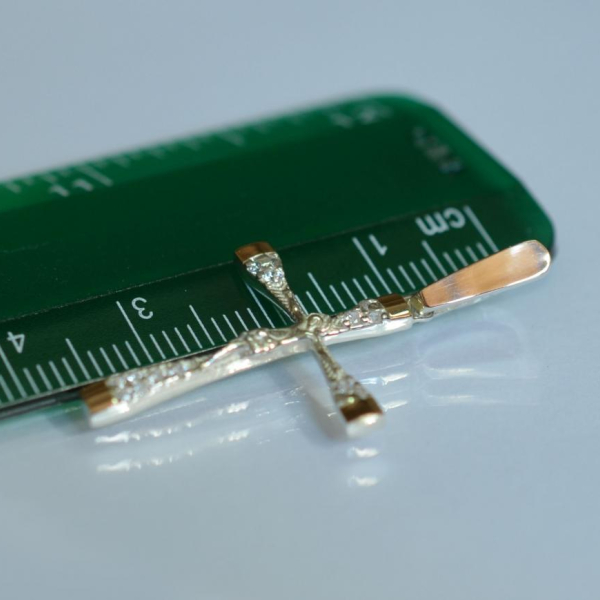 Срібний хрестик з золотими вставками