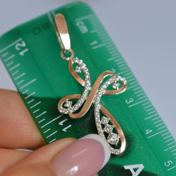 Срібний хрестик з золотими вставками