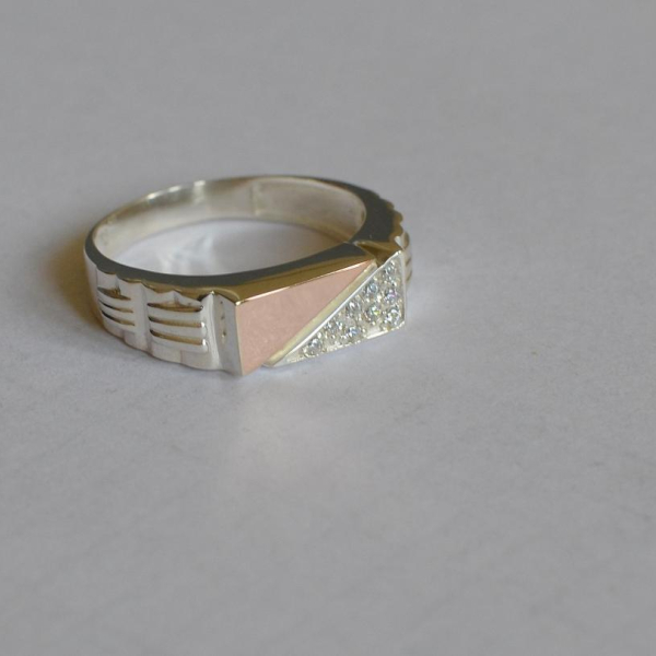 Срібний перстень з пластинами із золота