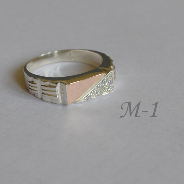 Срібний перстень з пластинами із золота