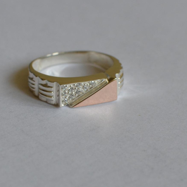 Срібний перстень з пластинами із золота