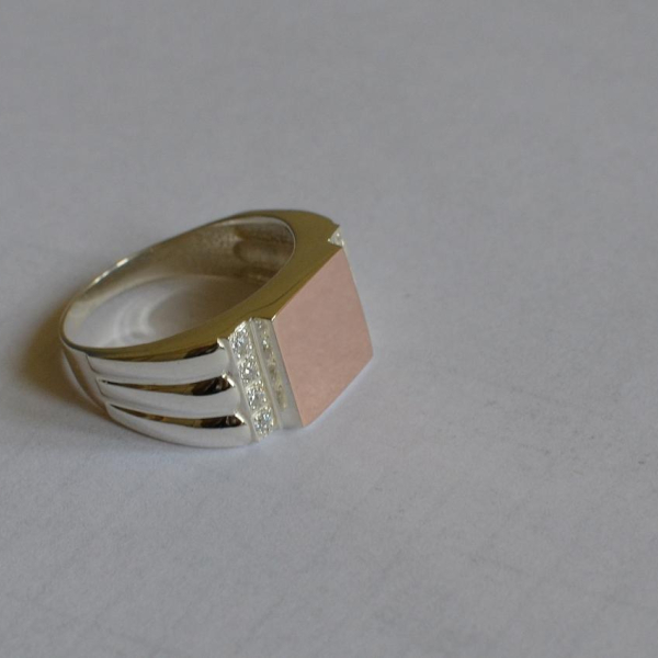 Срібний перстень з золотими пластинами