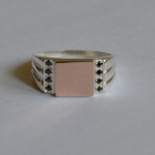 Срібний перстень з золотими пластинами