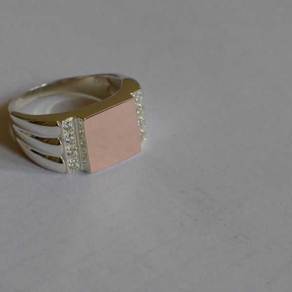 Срібний перстень з золотими пластинами