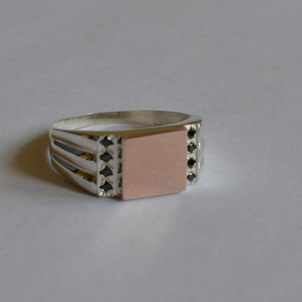 Срібний перстень з золотими пластинами