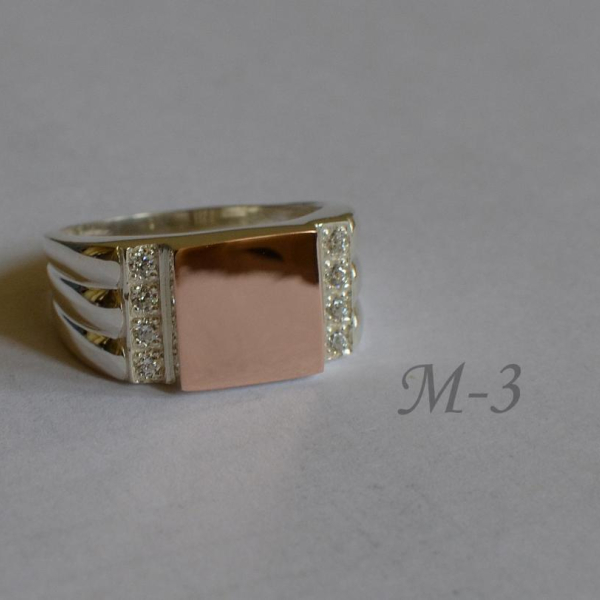 Срібний перстень з золотими пластинами