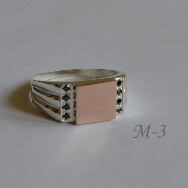 Срібний перстень з золотими пластинами