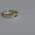 Срібний перстень з золотими пластинами