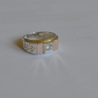 Срібний перстень з золотими пластинами