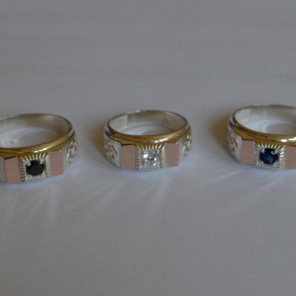 Срібний перстень з золотими пластинами