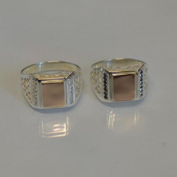 Срібний перстень  зі вставками з золота