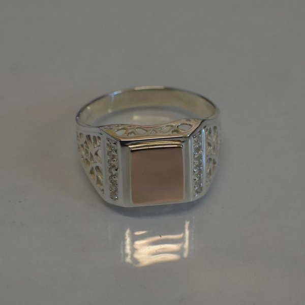 Срібний перстень  зі вставками з золота