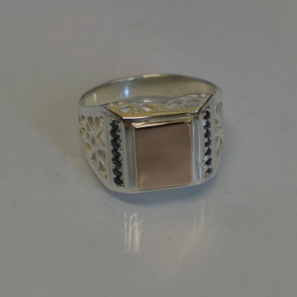 Срібний перстень  зі вставками з золота