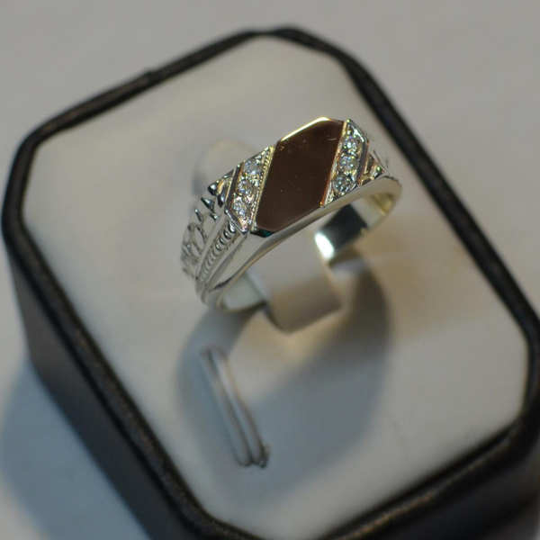 Срібний перстень  з накладками з золота