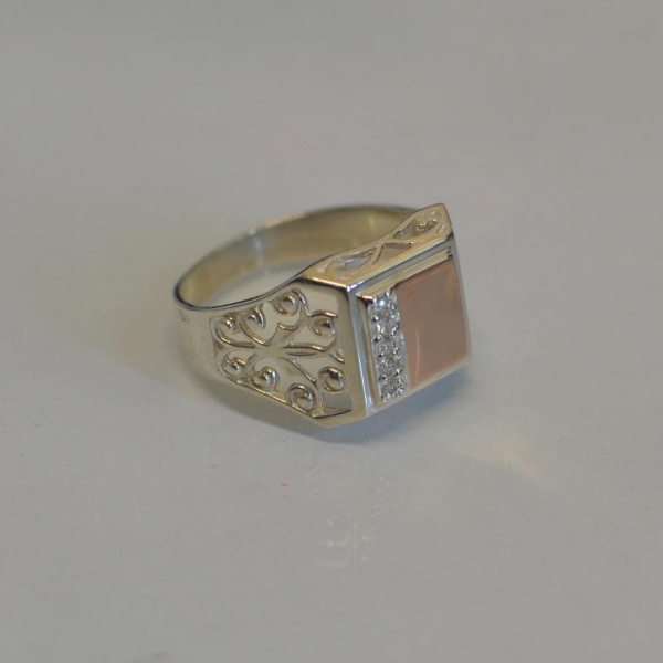 Срібний перстень з напайками із золота